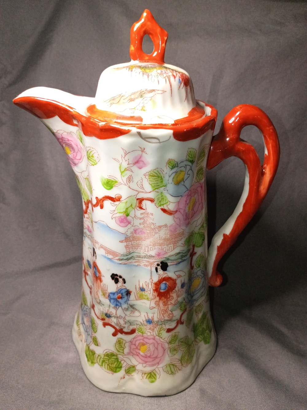Decorative Porcelain Pitcher with Red Accents and Floral Motif Geisha Girls